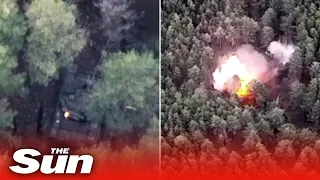 Ukrainian soldiers destroy three Russian tanks and ammo dump hidden in forest