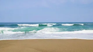 Splashing waves on the spring beach