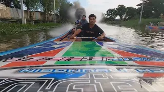 Longtail boatman shows off the blistering speed of his Diesel Turbo engine