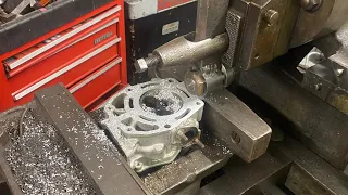 Metal shaper action on a cylinder head
