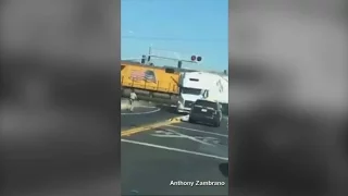 Dramatic Video Shows Cargo Train Smashing Into Truck In California