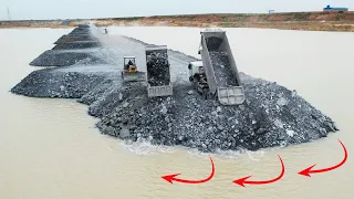 Good activities to build new roads skill operator driving bulldoze push stone with 12 wheel truck