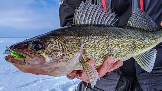 Ice Fishing the Mud Flats on Minnesotas Lake Mille Lacs with Rapala Jig Raps for Walleye | S14-E11