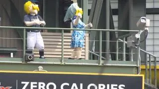 Bernie Brewer and his mother go down the slide