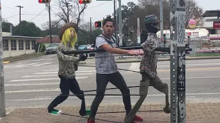 Man street dancing in Austin 2017 with puppets.MOV