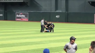 Fan runs onto field during Diamondbacks vs Brewers game and his pants fall off as he’s arrested