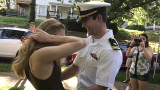 Sailor surprises fiancee at graduation
