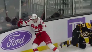 Charlie McAvoy Throws A Huge Hit On Martin Necas