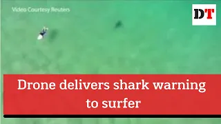 Drone delivers shark warning to surfer