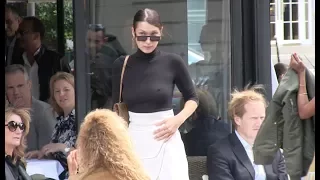 EXCLUSIVE - Bella Hadid having a coffee and a cigarette on the terrace of l Avenue in paris