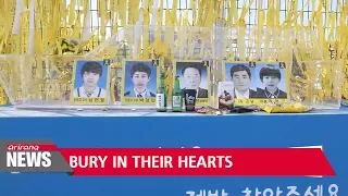 Families of missing victims of Sewol Ferry disaster decide to end search