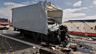 VN24 - Driver's cab is pressed onto the loading area in truck accident