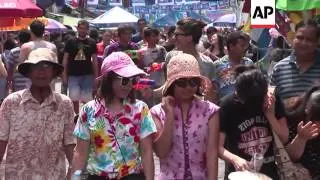 Revellers celebrate the Buddhist New Year with water fights