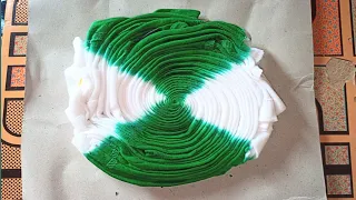 Tie-dye pattern. Green and white spiral