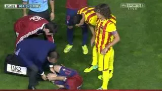 Carles Puyol helps an injured player Osasuna vs Barcelona 19/10/2013