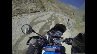 Riding a BMW F650 GS Dakar up the Anzob Pass at 3400 m. altitude in Tajikistan.