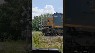 CSX train hits railroad crossing