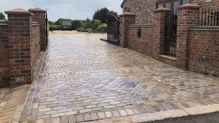 Natural stone drive way cleaned and sealed