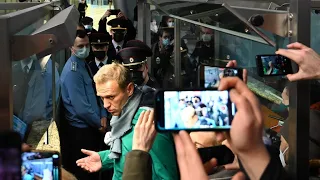 Kremlin critic Navalny faces potential arrest as he flies back to Russia