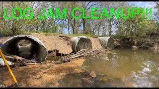 unclogging culverts/massive jam 3/27/23