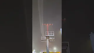 Boeing 777-300-ER in the fog landing at LAX