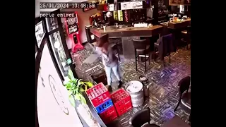 Woman falls down a hole while entering a cafe