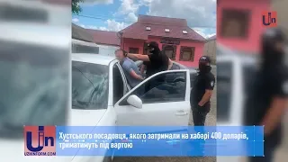 Хустського посадовця, якого затримали на хабарі 400 доларів, триматимуть під вартою