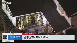 Car slams into Seal Beach home