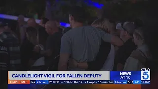 Candlelight vigil held for slain L.A. County Deputy Sheriff