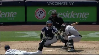 Yermin Mercedes gets fooled by the curveball and accidentally ducks his head into a hit-by-pitch