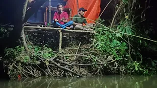 camping, heavy rain accompanied by very extreme thunder and lightning on the river bank