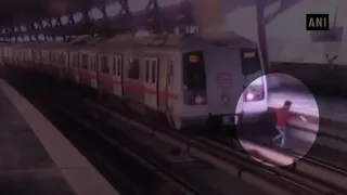 Video: Man crosses tracks at Delhi Metro station as train starts moving