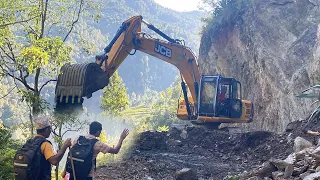 JCB excavator vs hilly landslide | JCB 225 LC excavator clearing blocked road | JCB video