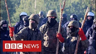 Warnings that Belarus migrant crisis risks military conflict - BBC News