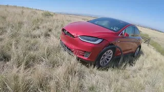 Tesla crashed down a hill