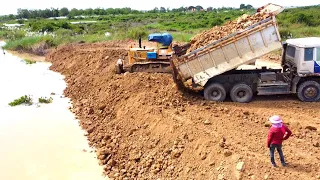 Excellent Techniques skill operator Bulldozer pushing soil Filling up the mud for Build new Road