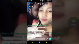 Indian boy sax with chinez girl on iom call