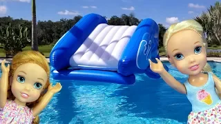 Water Slide ! Elsa and Anna toddlers - pool playdate - Barbie - floaties - swim - water fun - splash