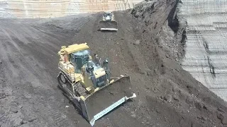 Two Caterpillar D9T Bulldozers Building A Ramp In Coal Mine