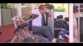 Putin and his prime minister Dmitry Medvedev busy working out in a gym