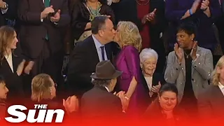 Bizarre moment Jill Biden kisses Kamala Harris' husband on the lips