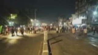 Yangon protesters break curfew after police trap 200