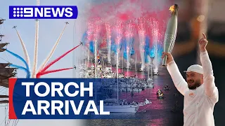 Olympic torch arrives in Marseilles to spectacular ceremony | 9 News Australia