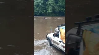Bougainville flood river wet crossing.