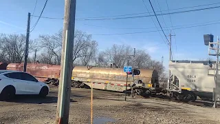 CN Mix Freight Train Going Past the Spaulding Junction, IL On A Nice Day.