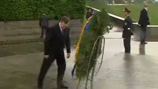 President Viktor Yanukovych of Ukraine Gets knocked on the Head by a Wreath