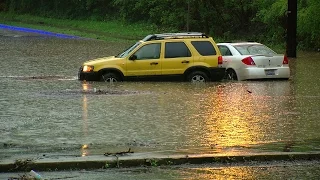 Residents clean up after local flash flooding