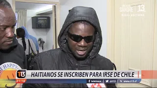 Haitianos se inscriben para irse de Chile