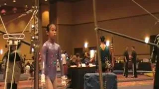 2010 WOGA Classic level 8 Bar champion with score 9.9 -- Emily Zeng