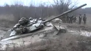 Off-road Russian tank T-90 (1000HP) stuck in the mud